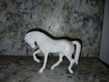 Unpainted Hartland Tinymite Quarter horse prancer